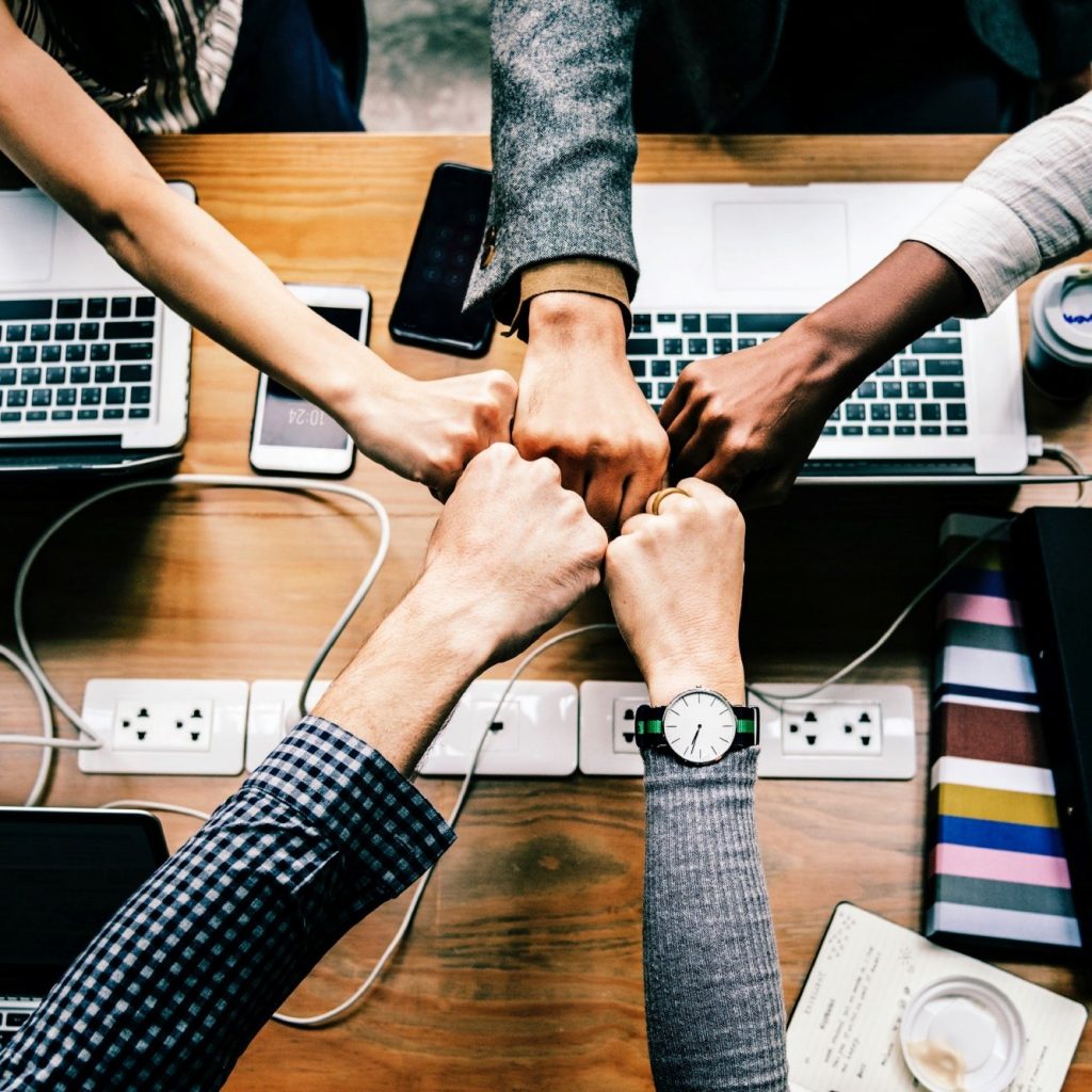 fist-bump-working-together-for-it-support