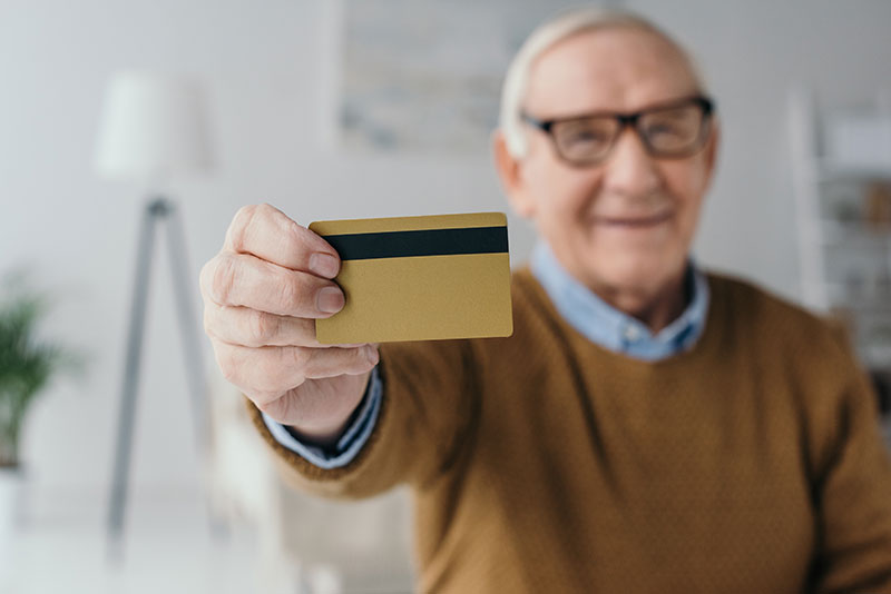 man with credit card in Fort Collins, Co.