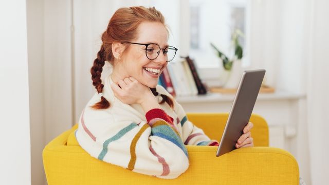 woman reading it security newsletter